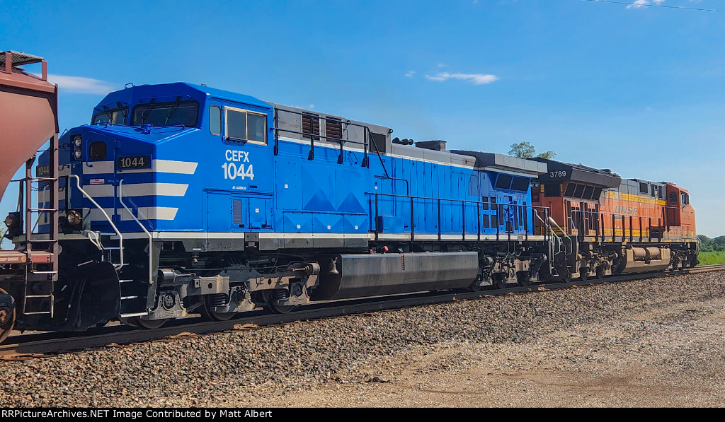 CEFX 1044 with a grain train on the west side of Augusta
